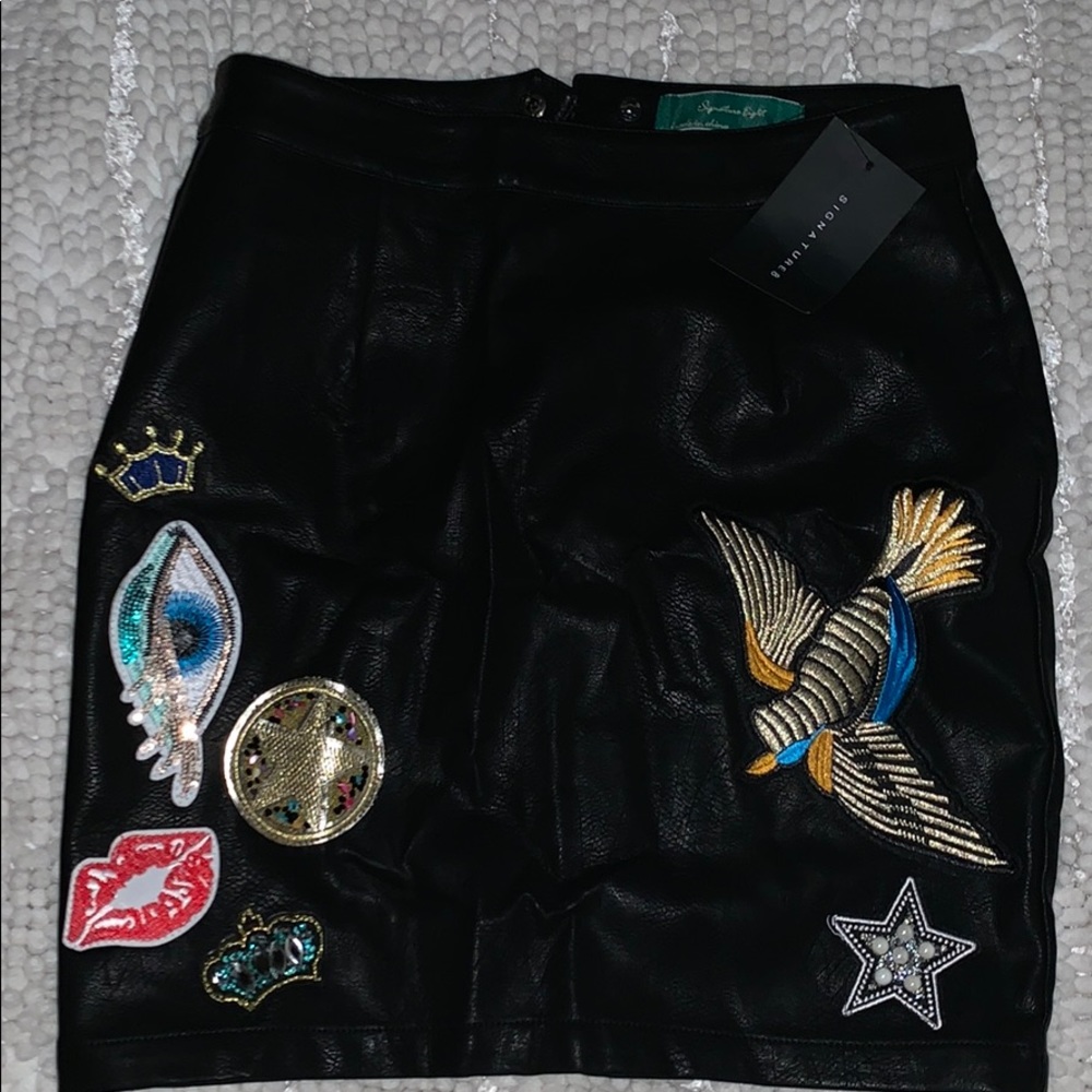 Super cute leather printed skirt....